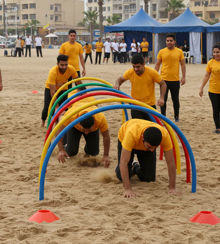 Beach Olympics team event with competitive games on the sand and team spirit, hosted by MRM Events.
