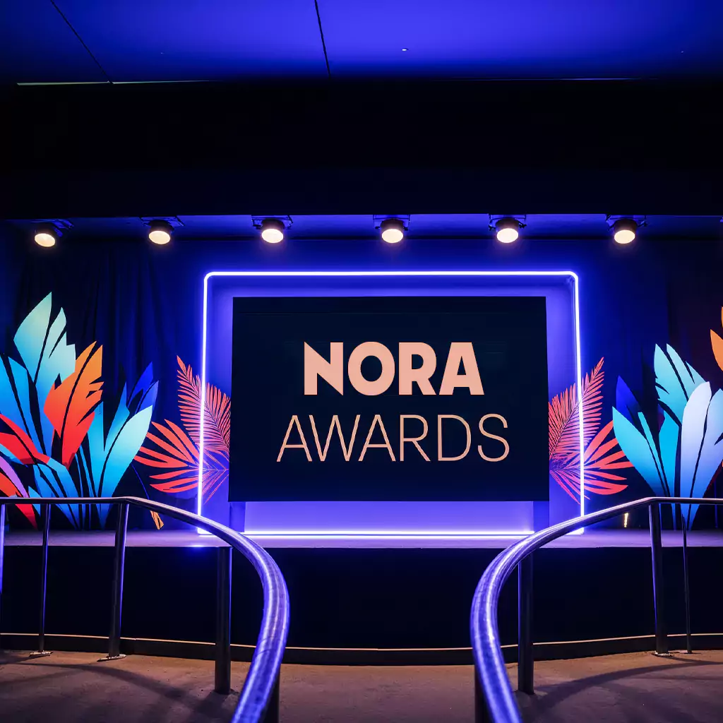 A high-end awards gala with impeccable arrangements and a stylish layout, celebrating corporate excellence.