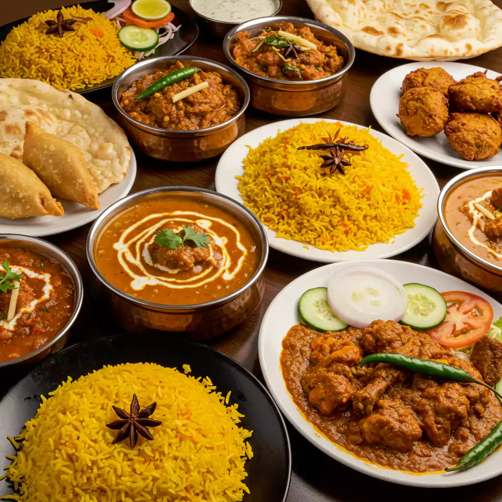 "Indian dishes for business meeting catering in Dubai, featuring curry, biryani, naan, and samosas for flavorful corporate meals. "
