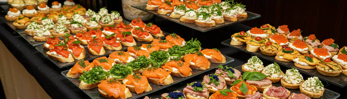 A colorful variety of canapés for business meeting catering, ideal for elegant corporate catering services and events in Dubai.