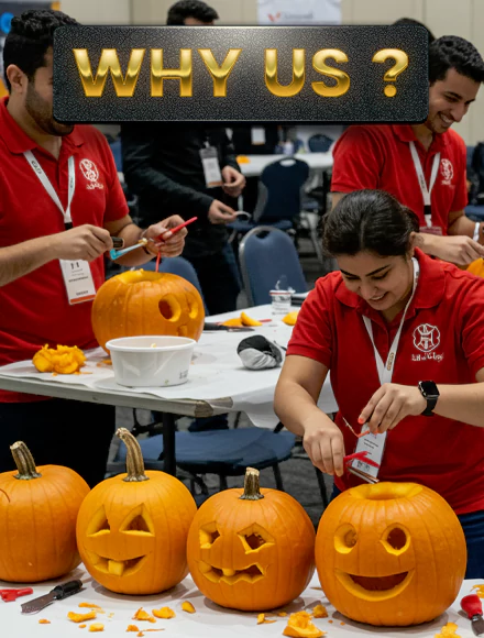 Corporate team-building activity in Dubai featuring employees carving pumpkins, fostering creativity, collaboration, and engagement in a fun workshop setting.