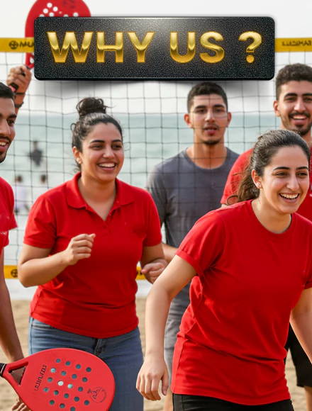 Why Us? Outdoor team-building activity in Dubai featuring employees enjoying a beach paddle game, promoting teamwork