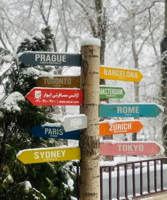 Flat lay of a calligraphy sketchbook, laptop and coffee cup, representing creative invitation design by MRM Events.