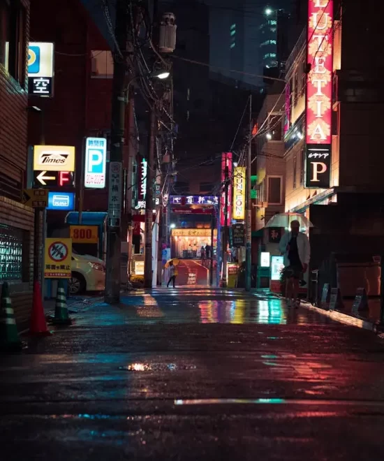 Vibrant urban scene with digital billboards and skyscrapers at night, illustrating dynamic city venue possibilities with MRM Events.